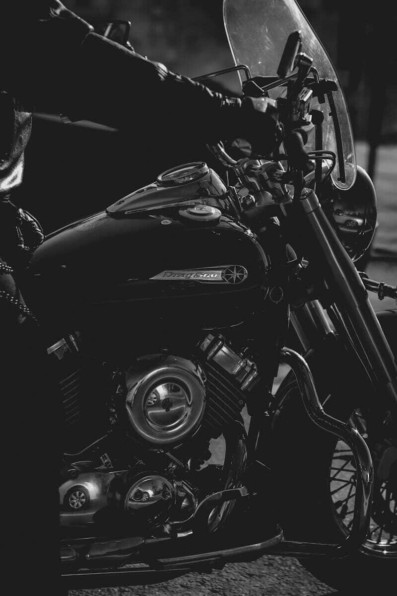 Dramatic monochrome shot of a luxury motorcycle showcasing engine details.
