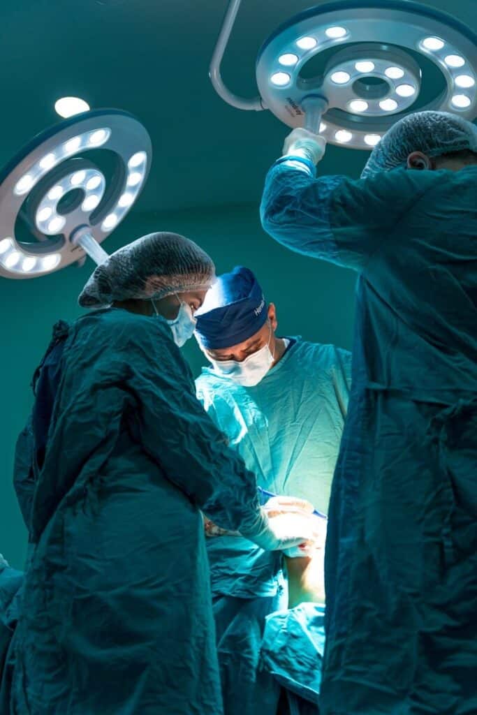 Current image: a group of doctors performing surgery on a patient